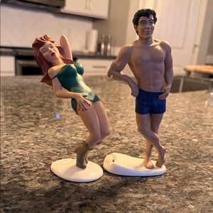 Vintage Bottoms Up Dynamic Figurine Duo with Red and Blue Accents